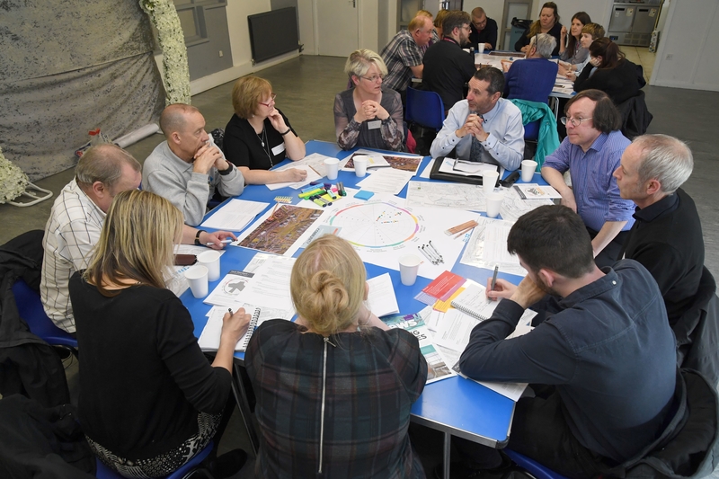 Group of people working together at the table